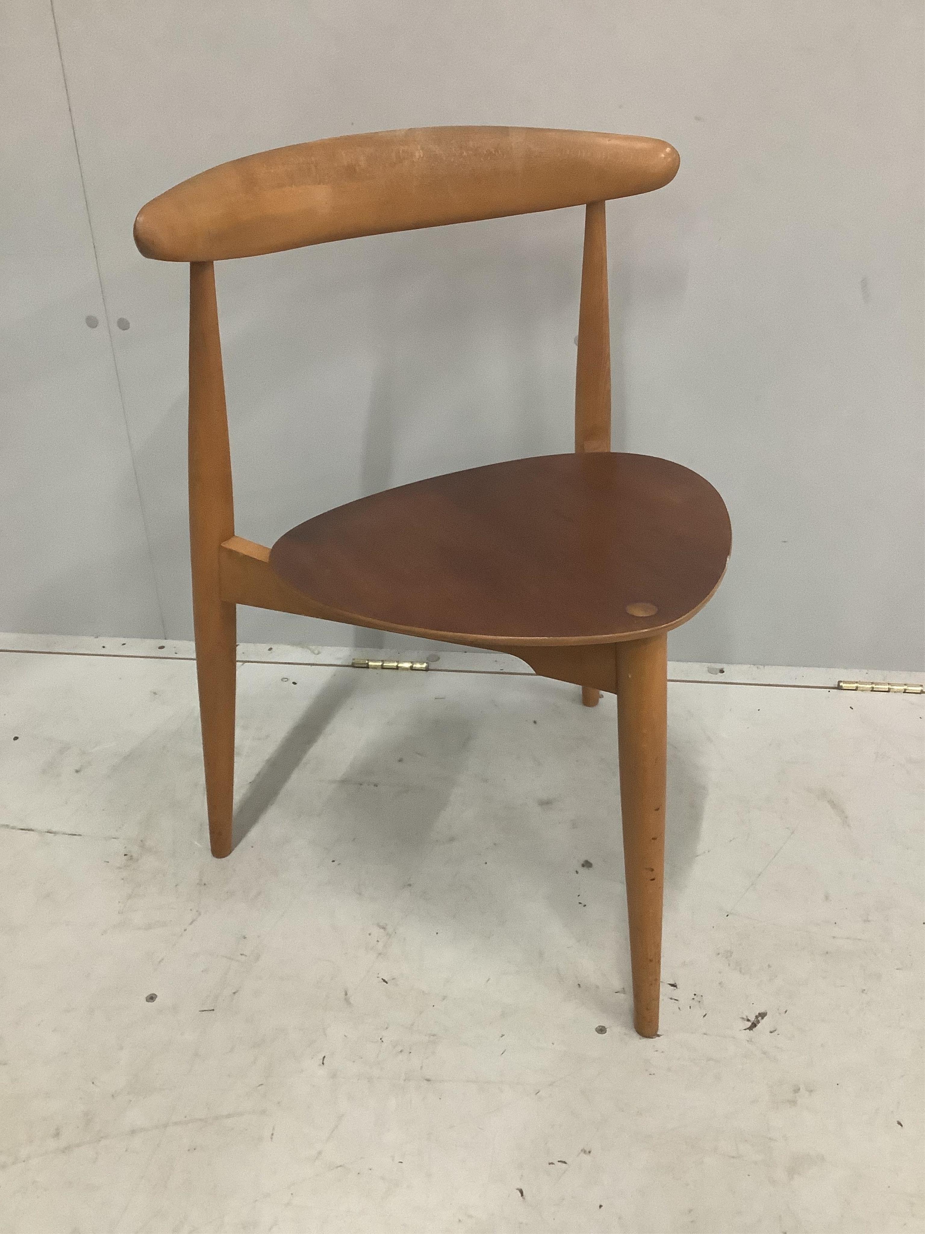 A Hans Wegner for Fritz Hansen 'Heart' dining chair, in beech and teak, Danish circa 1952, width 53cm, depth 40cm, height 73cm. Condition - fair